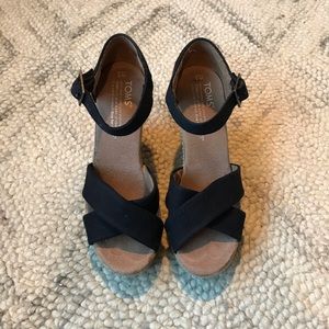 TOMS black wedge sandal.
